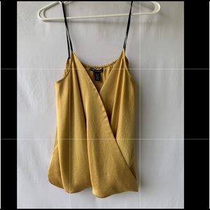 Gold top with black straps small snap closure